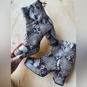 Snake Platform heeled Boots